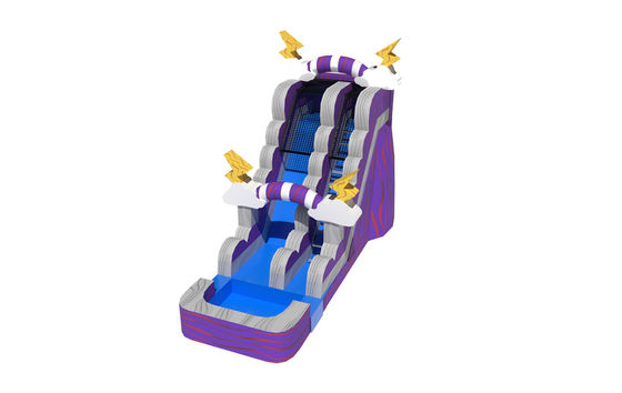 Glissière gonflable violet avec piscine et terrain de jeu extérieur