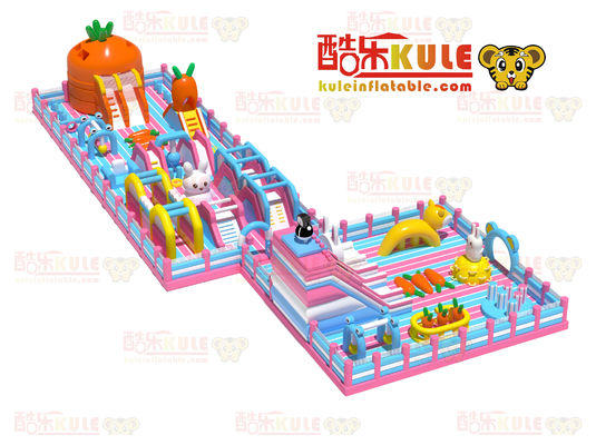 Château à sauter pour enfants gonflable à carotte (orange, bleu et rose)
