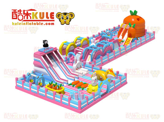 Château à sauter pour enfants gonflable à carotte (orange, bleu et rose)